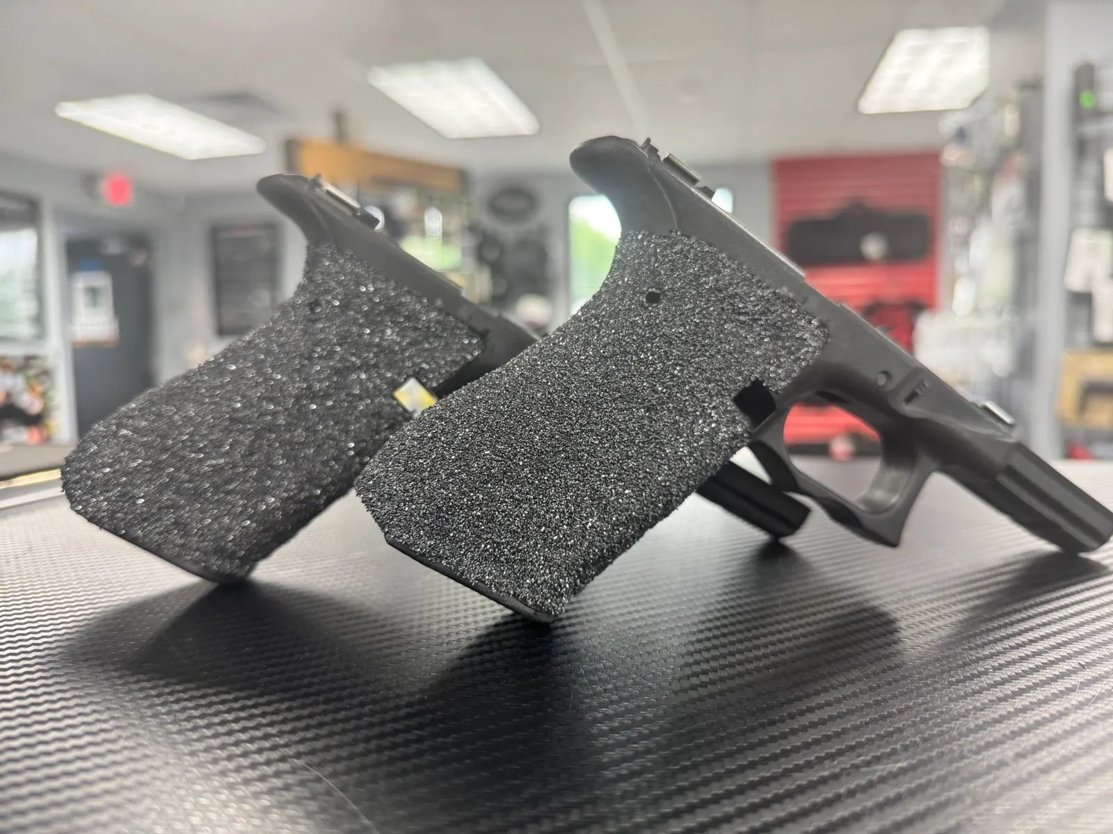 Stippled polymer pistol frames